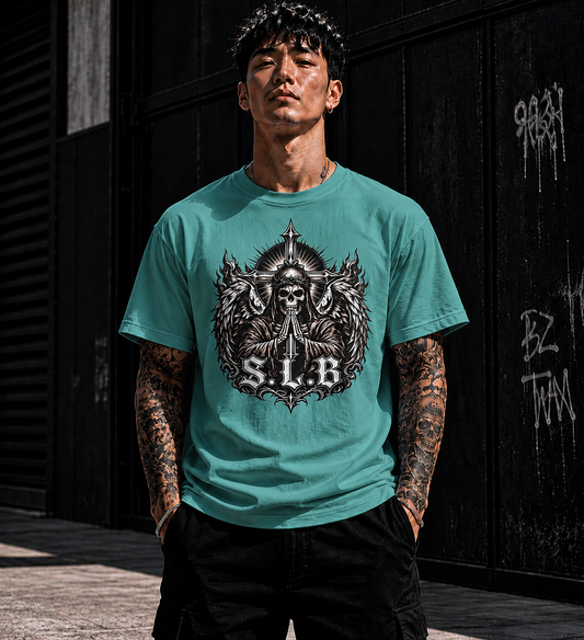 Seafoam SLB Guardian Reaper T-Shirt with winged skull, crossed swords, and radiant crest design symbolizing faith and strength