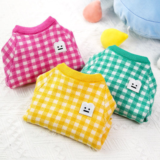Wool British style pet sweaters in smiley face rose red, green, and yellow grid patterns for warmth